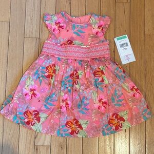 Pink floral smocked baby dress size 18months. Includes diaper cover. NWT